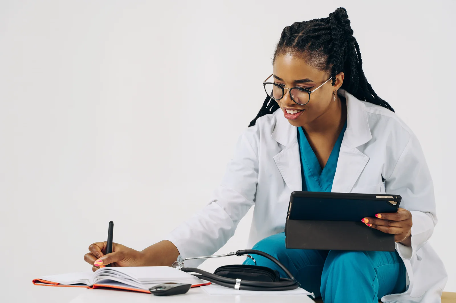 Clinician using a tablet during a workday
